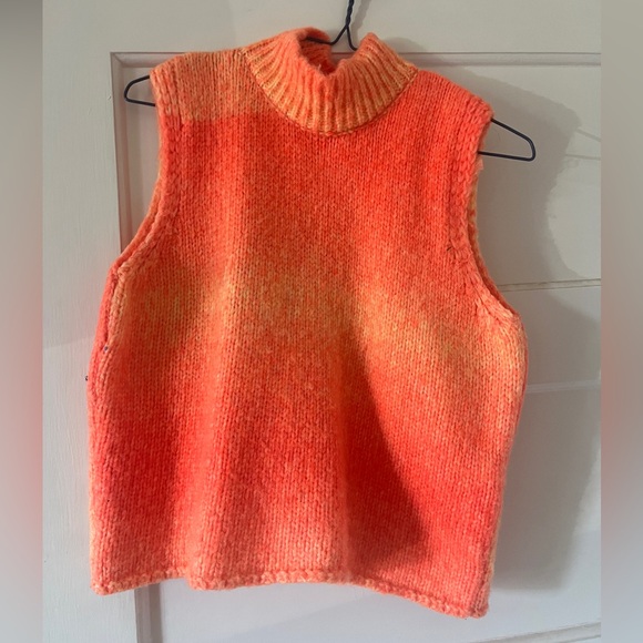 Bright orange sleeveless knit sweater. - Picture 1 of 2